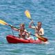 Jennette McCurdy wearing a pretty bikini and board shorts was spotted kayaking with a male friend in Maui