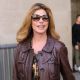 Shania Twain – Wearing a brown leather coat and flares at the BBC studios in London