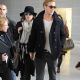 Eva Mendes and Ryan Gosling At Charles DeGaulle Airport, Paris November 27, 2011
