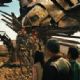 (Left to right) Sam Witwicky (Shia LaBeouf) speaks with the Autobot® Jetfire as his cohorts Mikaela Banes (Megan Fox), Agent Simmons (John Turturro) and Leo (Ramon Rodriguez) look on in “Transformers: Revenge of the Fallen.” Photo Credit: Cour