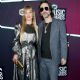 Chris Robinson of The Black Crowes  and Camille Johnson at the 2023 CMT Music Awards held at Moody Center on April 2, 2023 in Austin, Texas