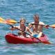 Jennette McCurdy wearing a pretty bikini and board shorts was spotted kayaking with a male friend in Maui