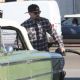 Benji Madden stops to re-fuel his classic car while out and about in Los Angeles, California on December 30, 2013