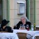 Queen guitarist Brian May soaks up the sunshine with a relaxing glass of wine alfresco