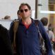 Michael Weatherly arrives at LAX (Los Angeles International Airport) carrying two handfuls of luggage