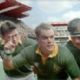 McNEIL HENDRICKS (second from left) as Chester Williams, SCOTT EASTWOOD (third from left) as Joel Stransky and MATT DAMON (center) as Francois Pienaar in Warner Bros. Pictures' and Spyglass Entertainment's drama 'Invictus,' a Warner Bros.