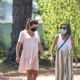 Lea Michele – Cradles her baby bump on a walk with her husband in Santa Monica