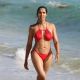 Padma Lakshmi in Red Bikini at the beach in Miami