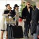 Eva Mendes and Ryan Gosling At Charles DeGaulle Airport, Paris November 27, 2011