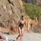 Paula Patton in Animal Print Swimsuit on Malibu Beach