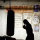 Hilary Swank as Maggie in Warner Bros. Pictures' drama Million Dollar Baby. The Malpaso production also stars Clint Eastwood and Morgan Freeman. Merie W. Wallace