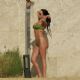 Anastasia Karanikolaou – In a lime green bikini at the beach in Mexico