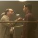 Paul Giamatti as Joe Gould and Russell Crowe as Jim Braddock in Universal Pictures, Cinderella Man 2005.