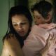 Jacinda Barrett and Jimmy Bennett in Adventure movie, a Poseidon - 2006