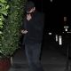 Leonardo DiCaprio keeps a low profile as he arrives at early celebration for his 49th birthday with girlfriend Vittoria Ceretti and pal Tobey Maguire
