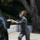Michelle Pfeiffer – In jumpsuit delivered a letter offering to buy a house in Brentwood