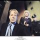 (l to r) Bruce Willis as Agent Greer and Radha Mitchell as Agent Peters in Touchstone Pictures' Surrogates. © Touchstone Pictures, Inc. All Rights Reserved.