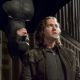 CHRISTIAN BALE starring as Batman and DAVID MURRAY in Warner Bros. Pictures action adventure Batman Begins.