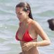 Thylane Blondeau – In a red bikini on the beach in South of France