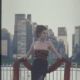 Gia now as a super successful model in New York poses for a high fashion shoot against the city's skyline.
