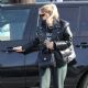 Ashley Benson – In green sweatpants and a black leather jacket shopping in West Hollywood